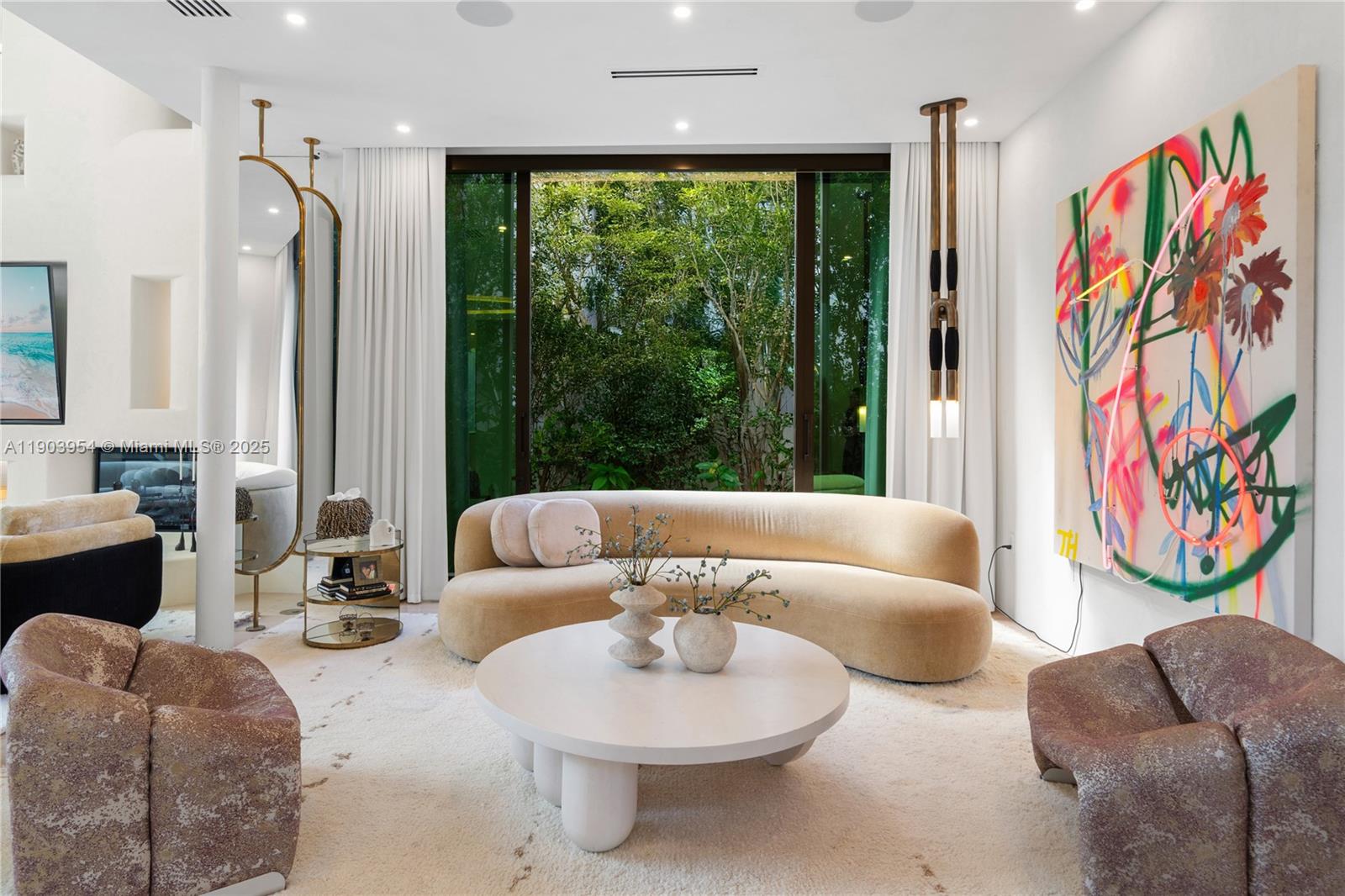 2053 North Bay Road Miami Beach, FL 33140 - Photo 10 of 99 a living room with furniture and a large window