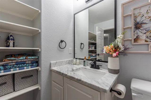 a view of a house with backyard porch and sitting area