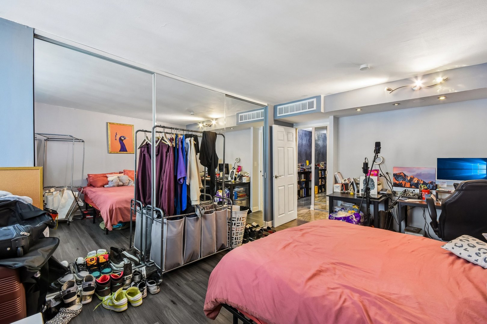 6007 North Sheridan Road, Unit 29F Chicago, IL 60660 - Photo 14 of 19 a bed room with a bed and a large mirror