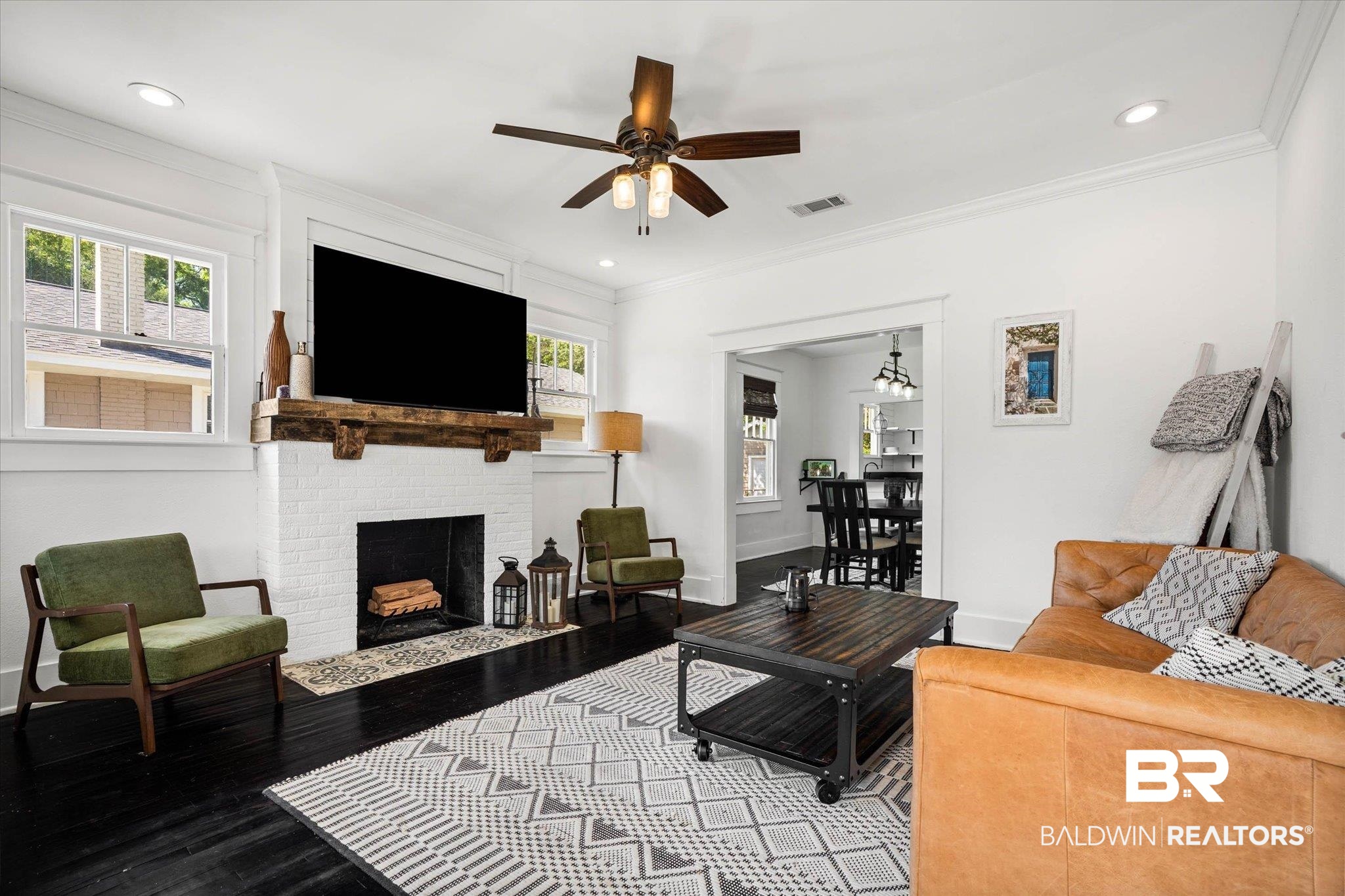 121 North Carlen Street Mobile, AL 36607 - Photo 3 of 21 Living room featuring wood finished floors, a ceiling fan, recessed lighting, a fireplace, and crown molding