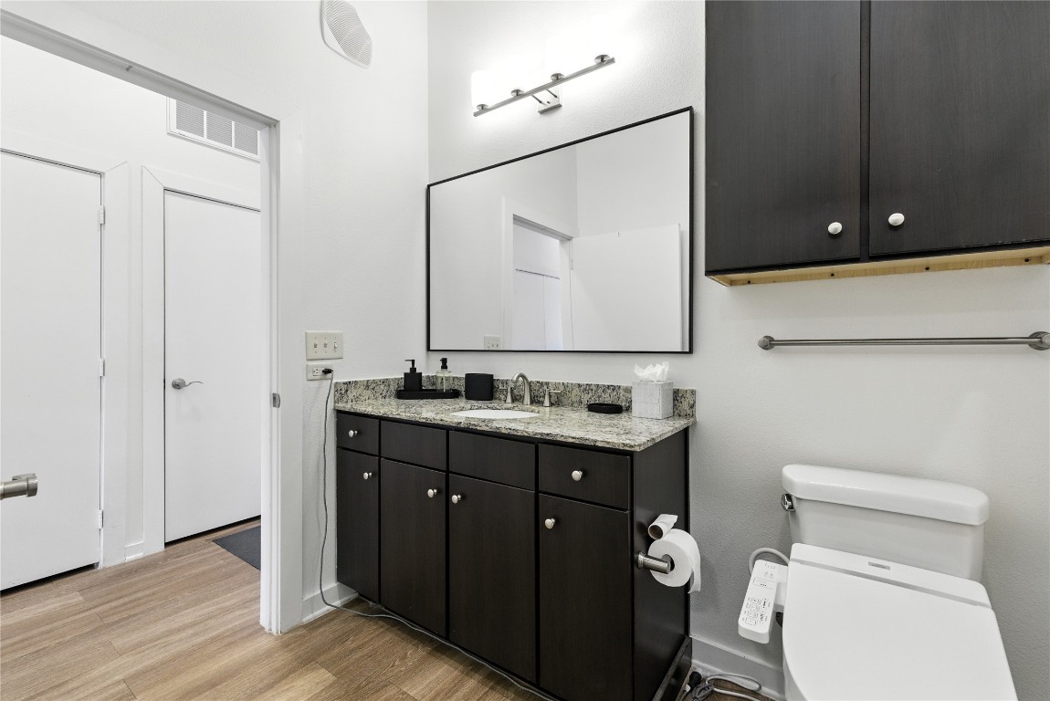 1900 Barton Springs Road, Unit 2003 Austin, TX 78704 - Photo 12 of 20 Bathroom connects to hallway for guests