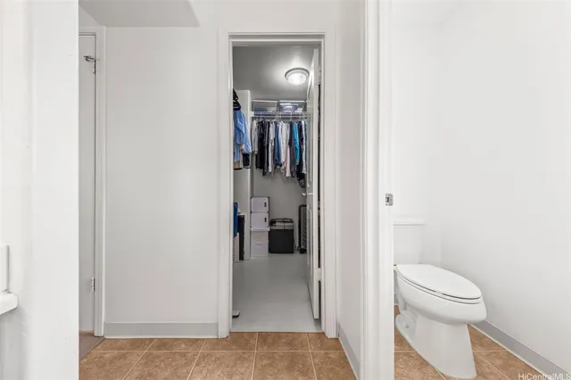 a bathroom with a toilet and a sink