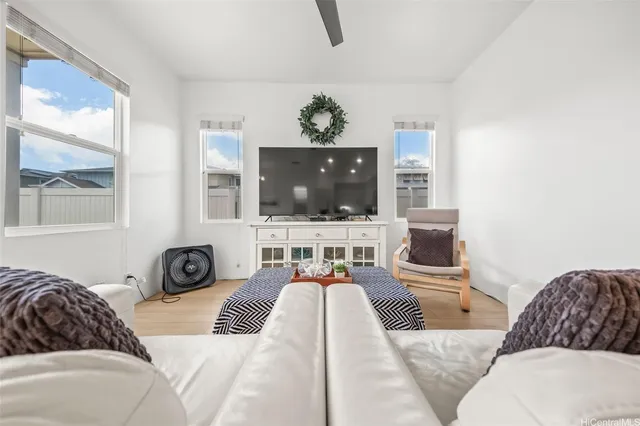 a living room with furniture and a couch