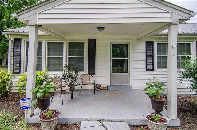 3463 Catholic Church Road Cedar Hill, TN 37032 - Photo 13 of 19 Pleasant sized covered porch