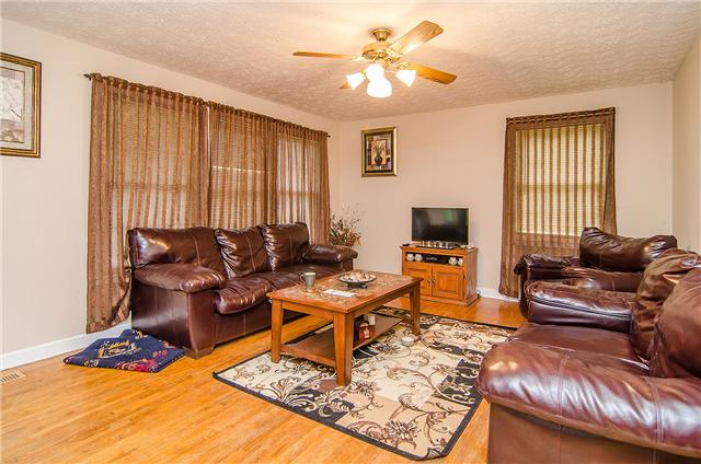 3463 Catholic Church Road Cedar Hill, TN 37032 - Photo 14 of 19 Comfortable living room with many windows and wood floors