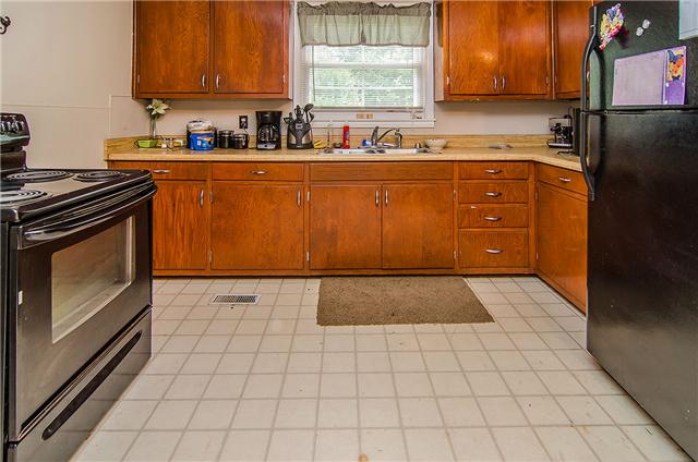 3463 Catholic Church Road Cedar Hill, TN 37032 - Photo 16 of 19 Warm cabinet finish