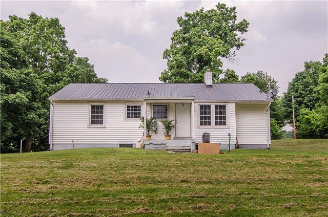 3463 Catholic Church Road Cedar Hill, TN 37032 - Photo 3 of 19 The back of the house has a small covered porch
