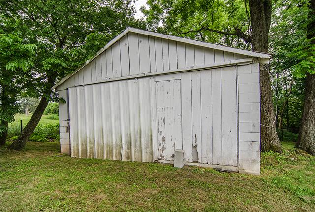 3463 Catholic Church Road Cedar Hill, TN 37032 - Photo 5 of 19 White storage shed