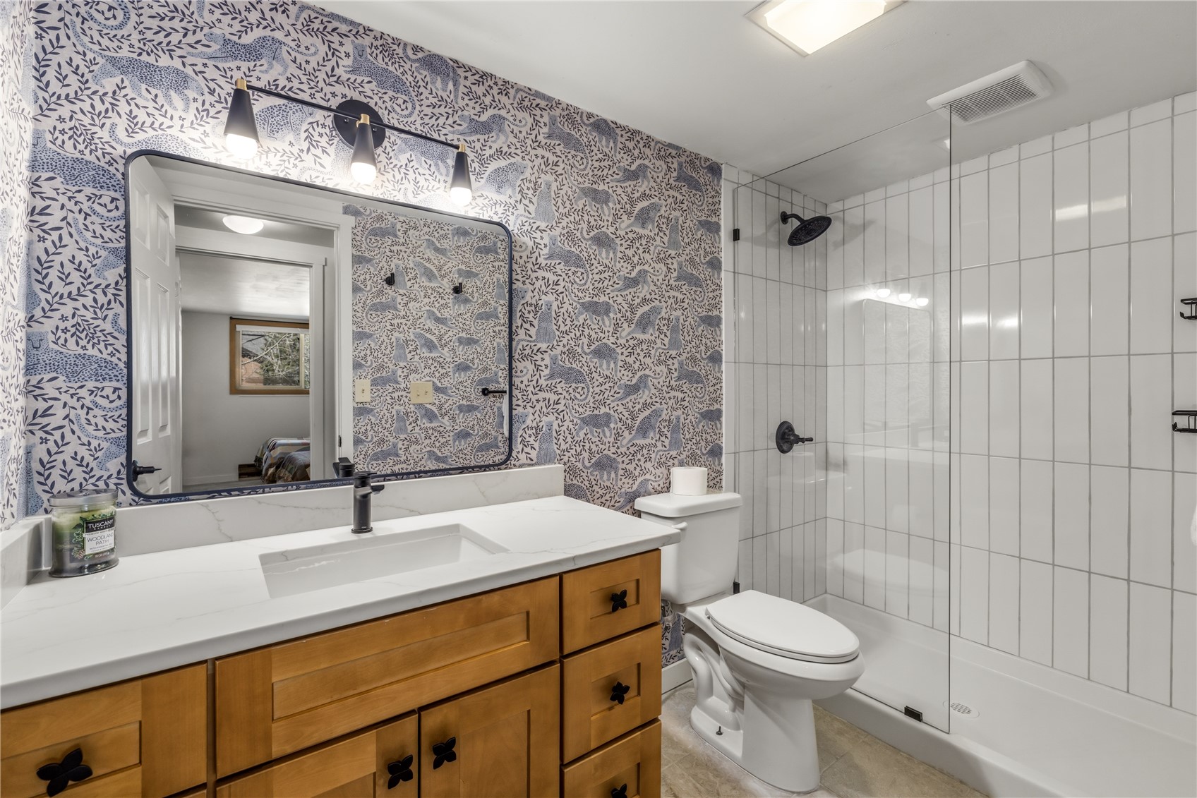 1375 Walton Creek Road, Unit 14 Steamboat Springs, CO 80487 - Photo 19 of 38 a bathroom with a sink a toilet and shower