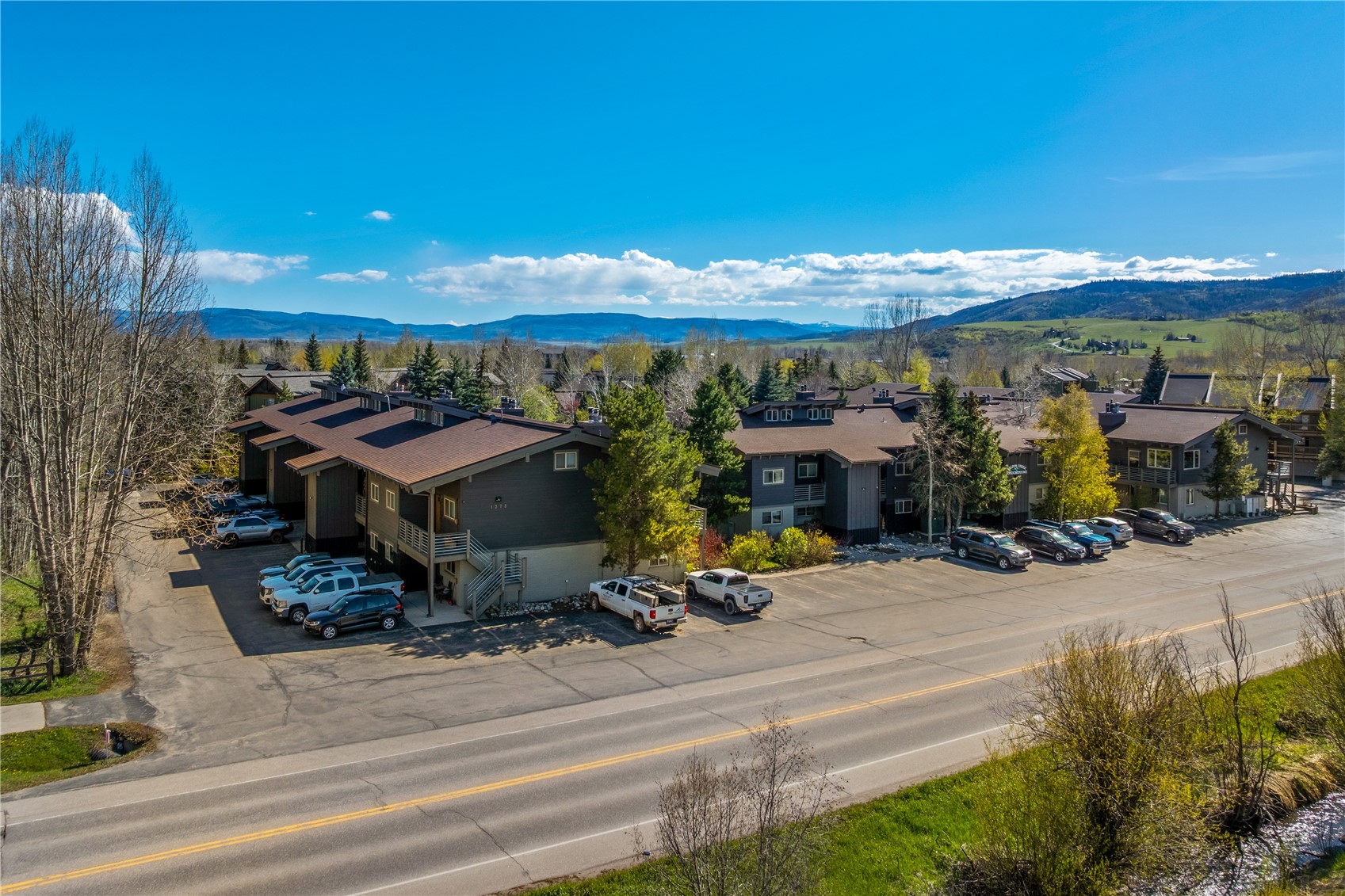 1375 Walton Creek Road, Unit 14 Steamboat Springs, CO 80487 - Photo 26 of 38 a view of a terrace with sitting area