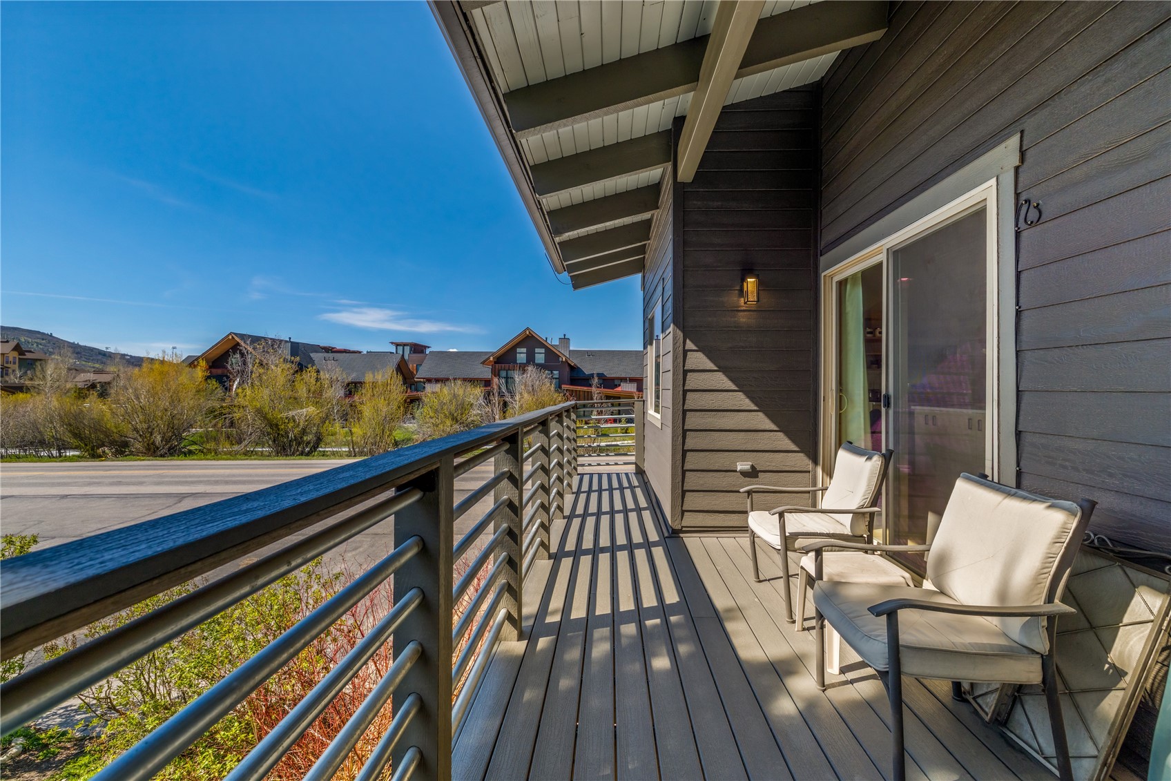 1375 Walton Creek Road, Unit 14 Steamboat Springs, CO 80487 - Photo 34 of 38 a view of balcony with wooden floor