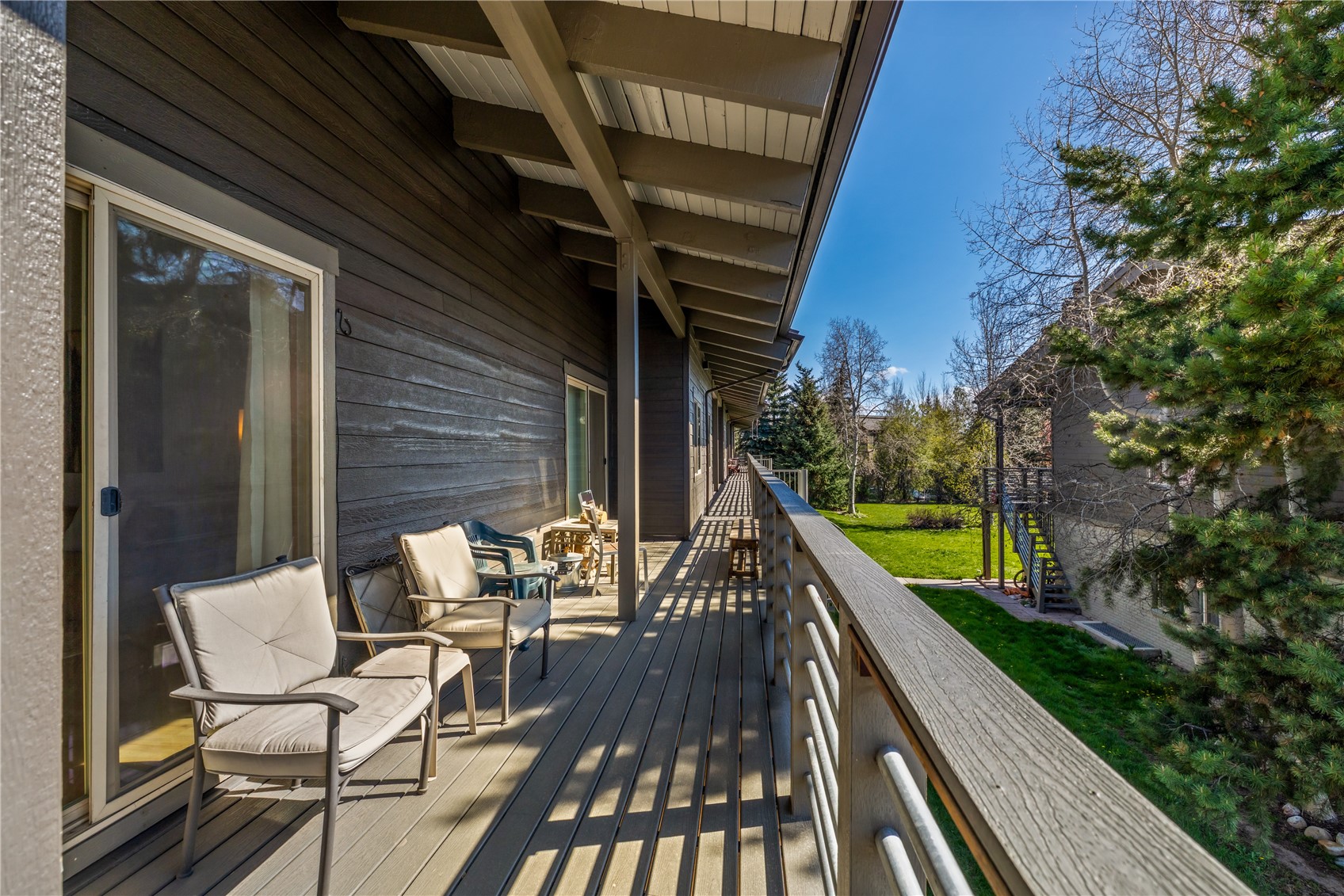 1375 Walton Creek Road, Unit 14 Steamboat Springs, CO 80487 - Photo 36 of 38 a view of deck with patio