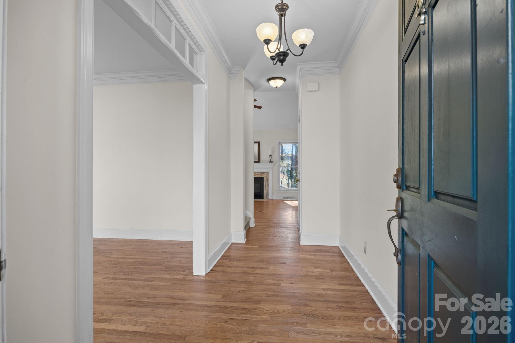 100 Martin Street Davidson, NC 28036 - Photo 13 of 47 a view of a hallway with wooden floor