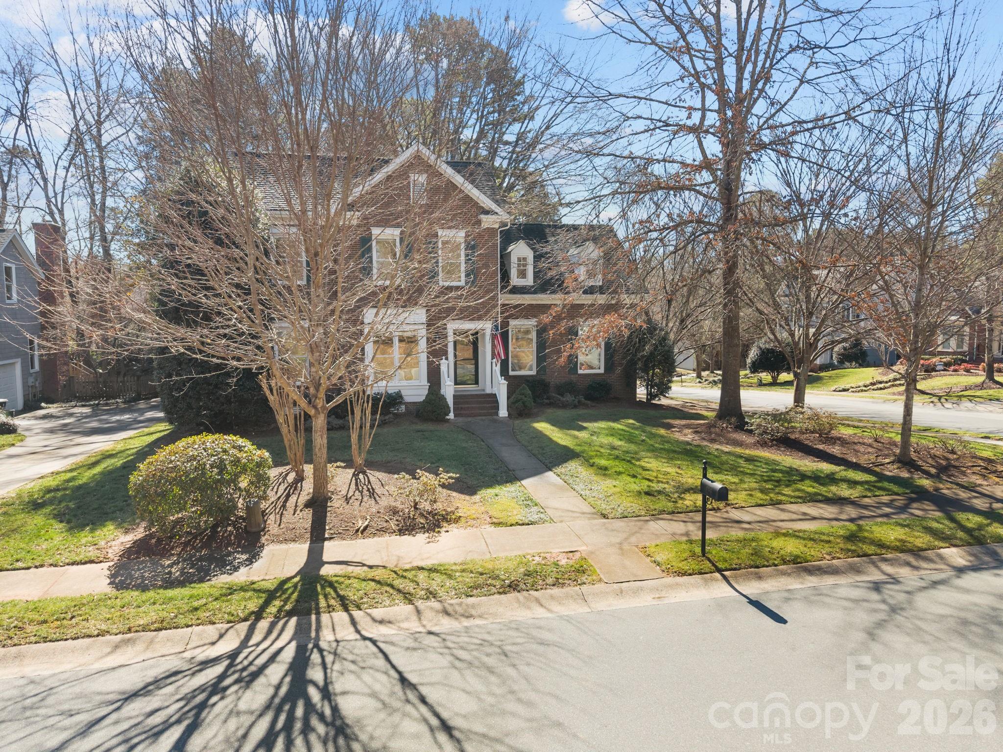 100 Martin Street Davidson, NC 28036 - Photo 2 of 47 a view of a house with snow on the background