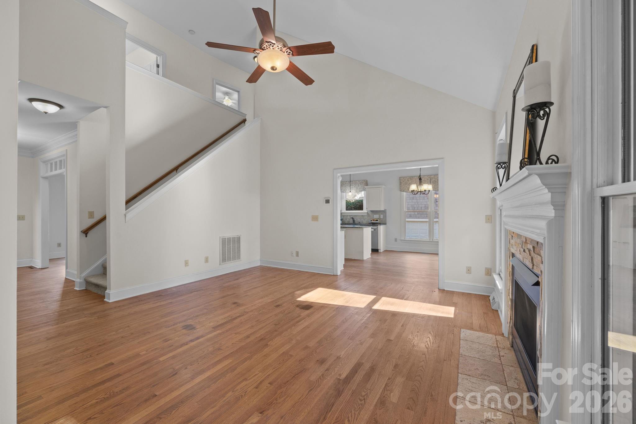 100 Martin Street Davidson, NC 28036 - Photo 21 of 47 a view of empty room with wooden floor and fan
