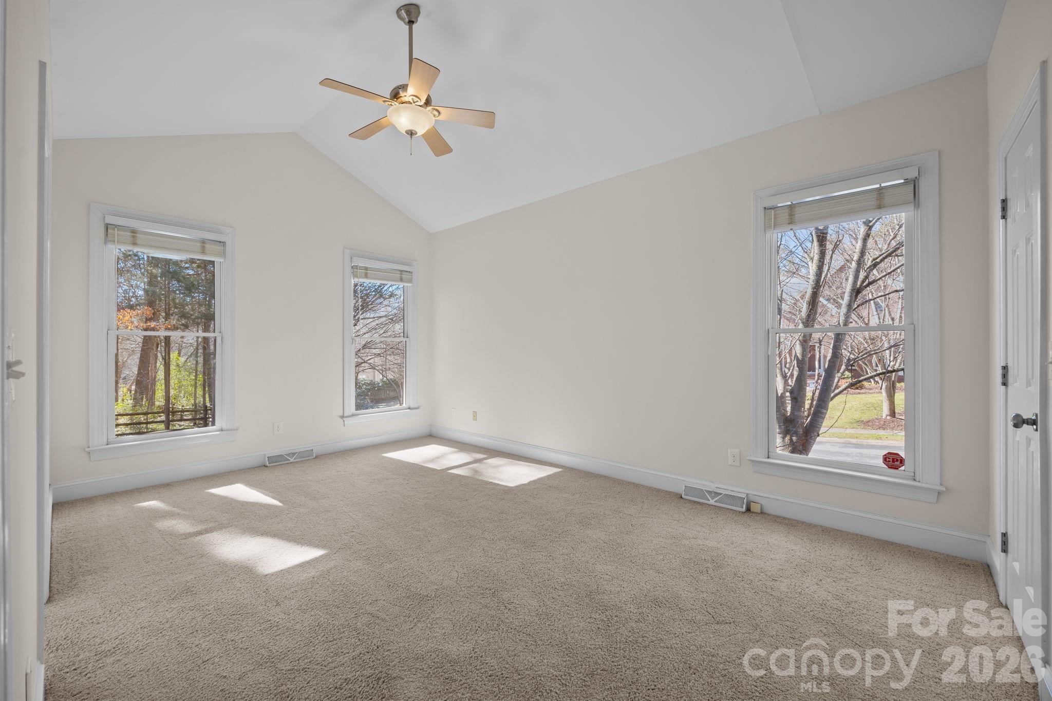 100 Martin Street Davidson, NC 28036 - Photo 36 of 47 an empty room with windows and fan