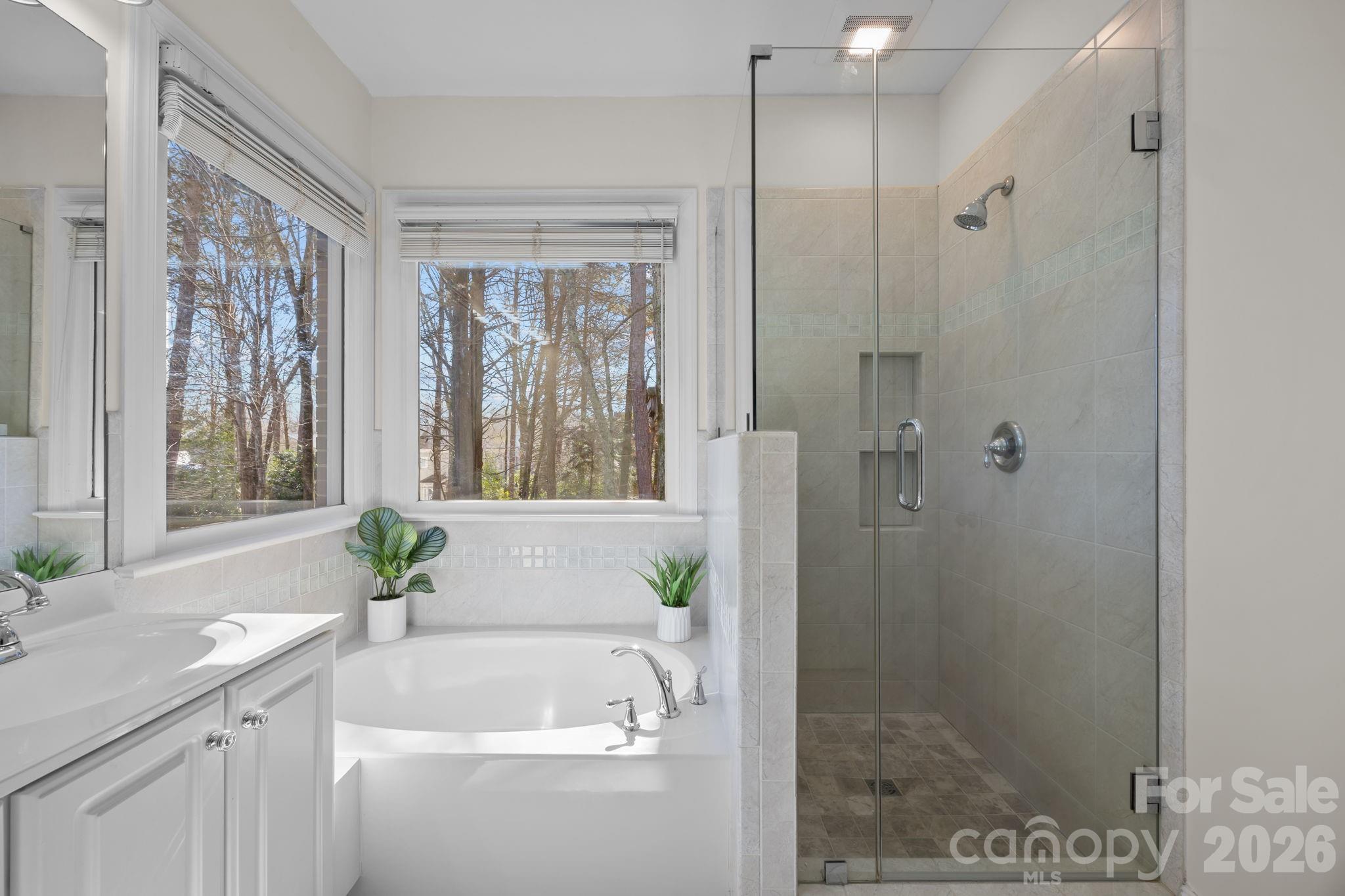 100 Martin Street Davidson, NC 28036 - Photo 39 of 47 a bath room with a shower and a sink