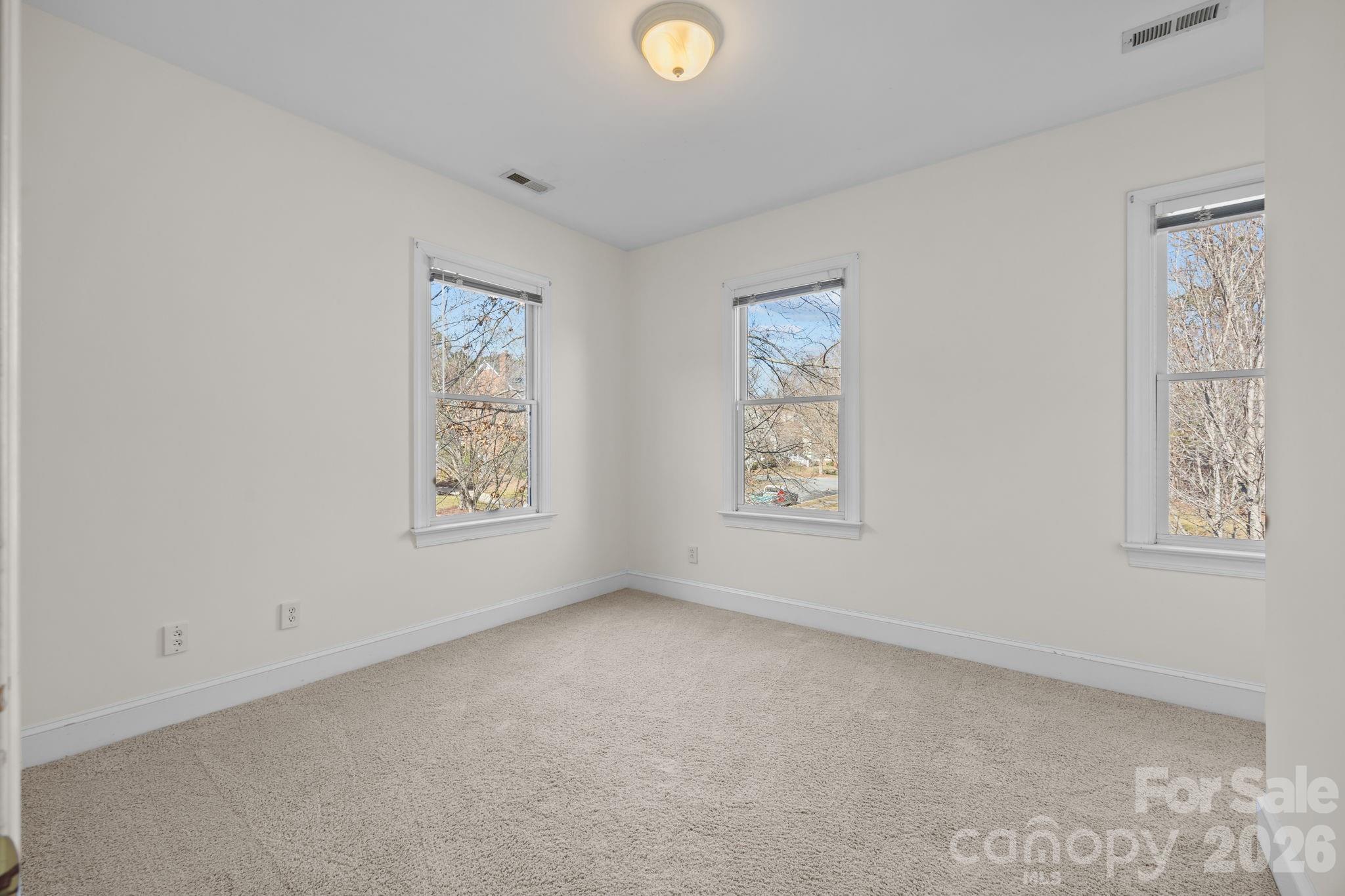 100 Martin Street Davidson, NC 28036 - Photo 45 of 47 a view of an empty room with a window
