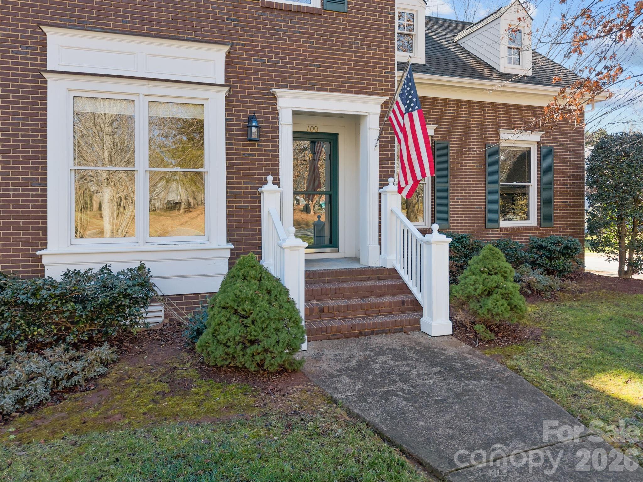 100 Martin Street Davidson, NC 28036 - Photo 5 of 47 a front view of a house with garden