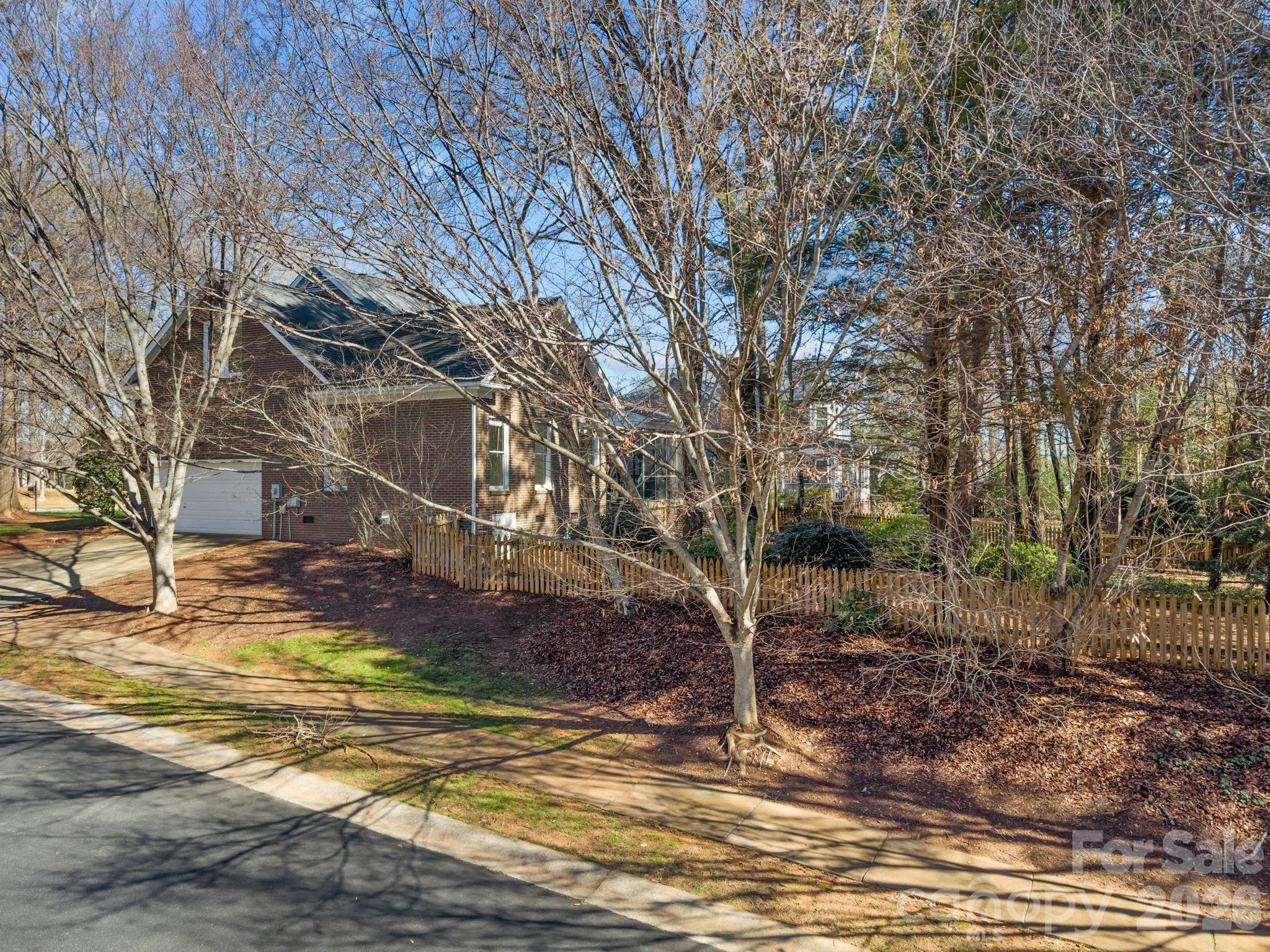 100 Martin Street Davidson, NC 28036 - Photo 9 of 47 a view of a yard with a house