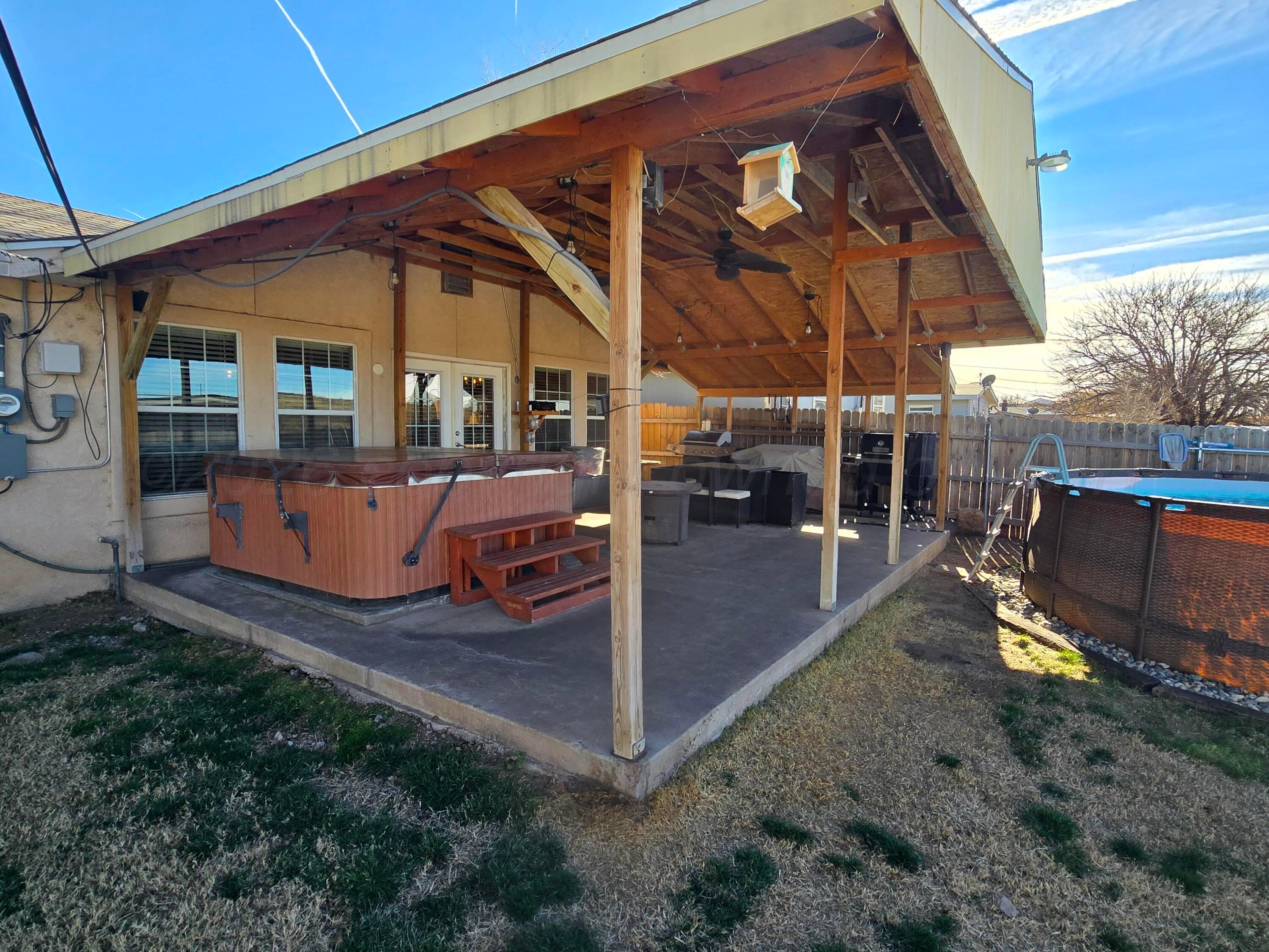 1121 Elmore Street Borger, TX 79007 - Photo 3 of 39 a view of a backyard with sitting area