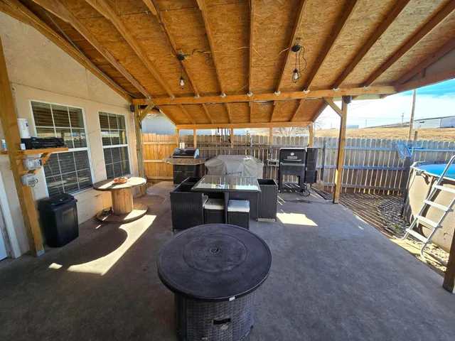 a view of a porch with furniture
