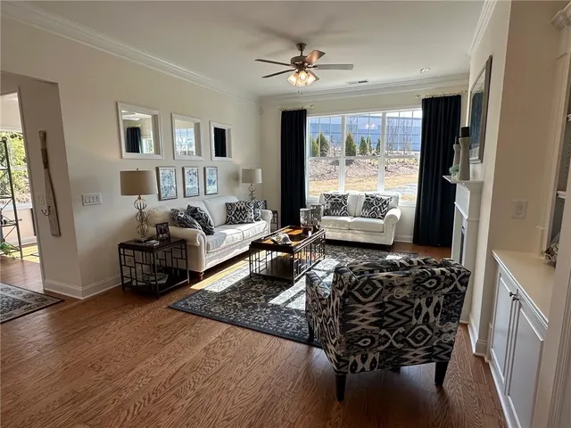 a bed room with furniture and a window