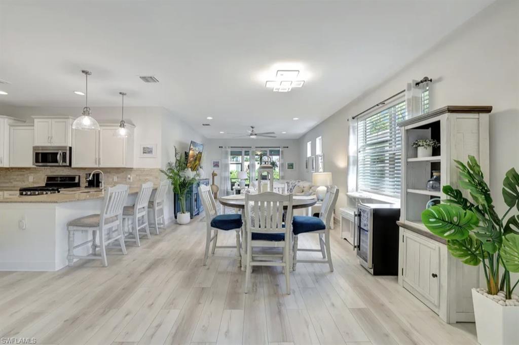 20183 Torch Key Way Estero, FL 33928 - Photo 6 of 30 Dining area featuring light wood-type flooring, ceiling fan, and recessed lighting