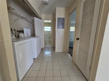 a view of a kitchen with a sink