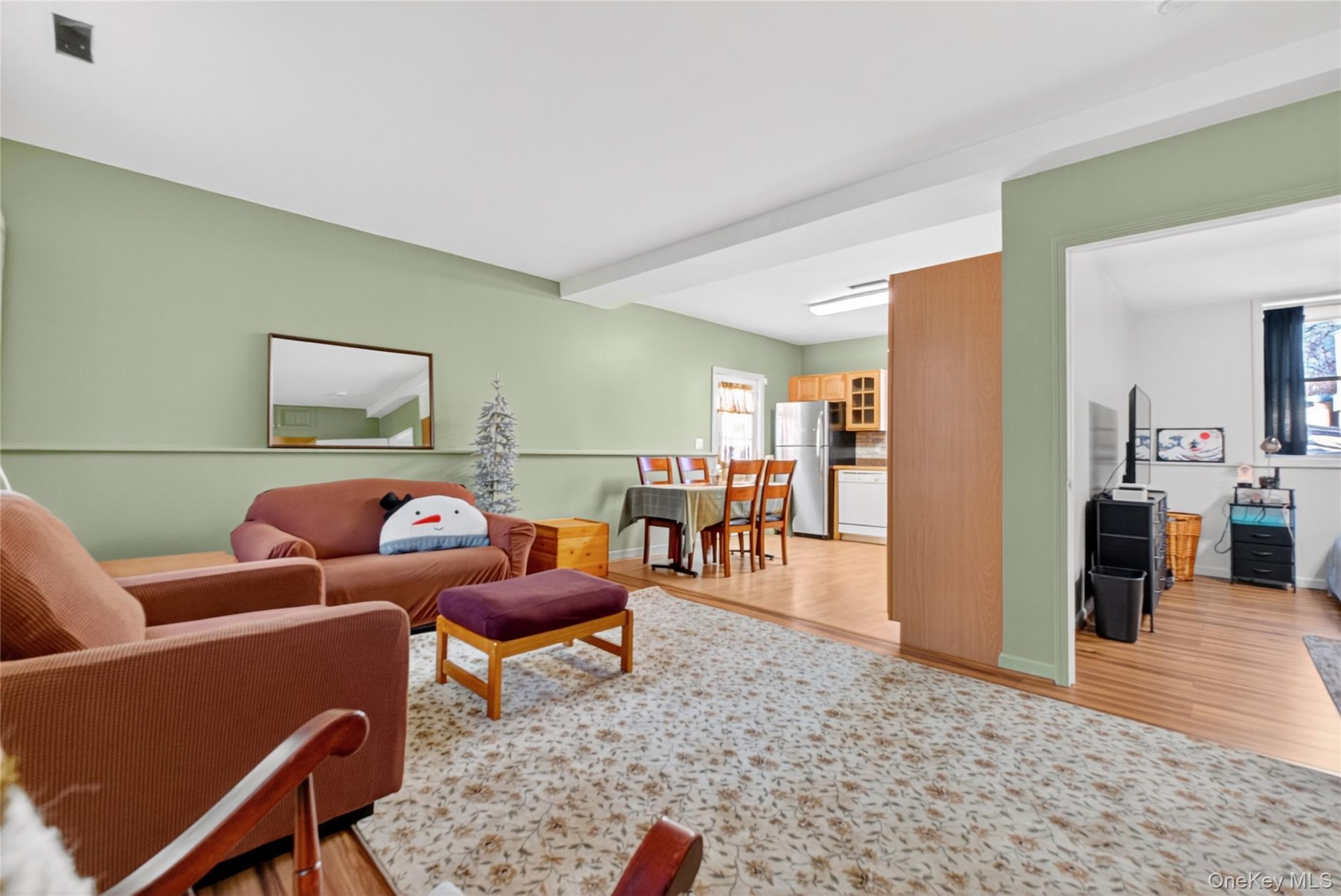 387 Cornwall Hill Road Patterson, NY 12563 - Photo 24 of 50 a living room with furniture and wooden floor