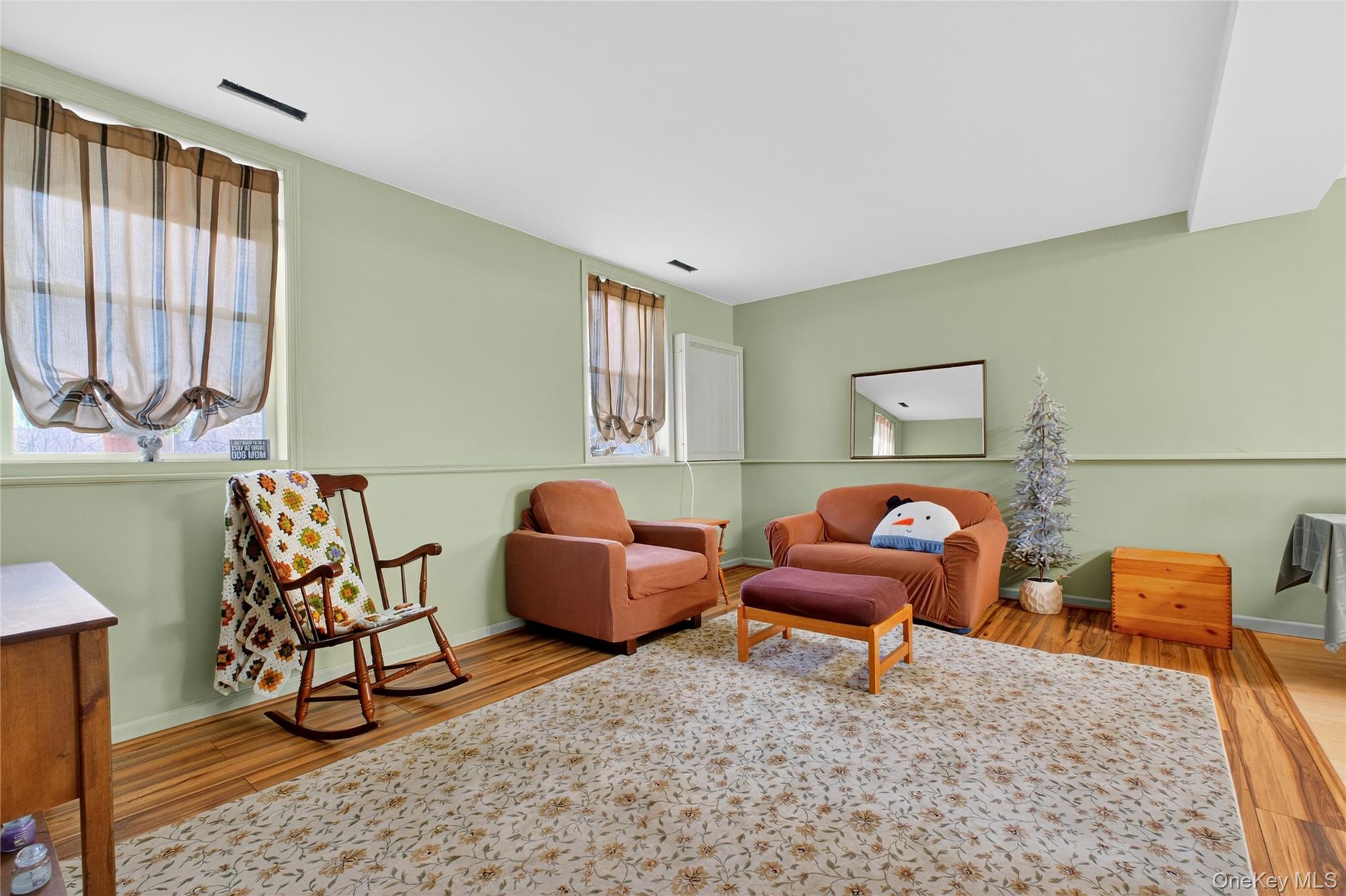 387 Cornwall Hill Road Patterson, NY 12563 - Photo 26 of 50 a living room with furniture rug and window