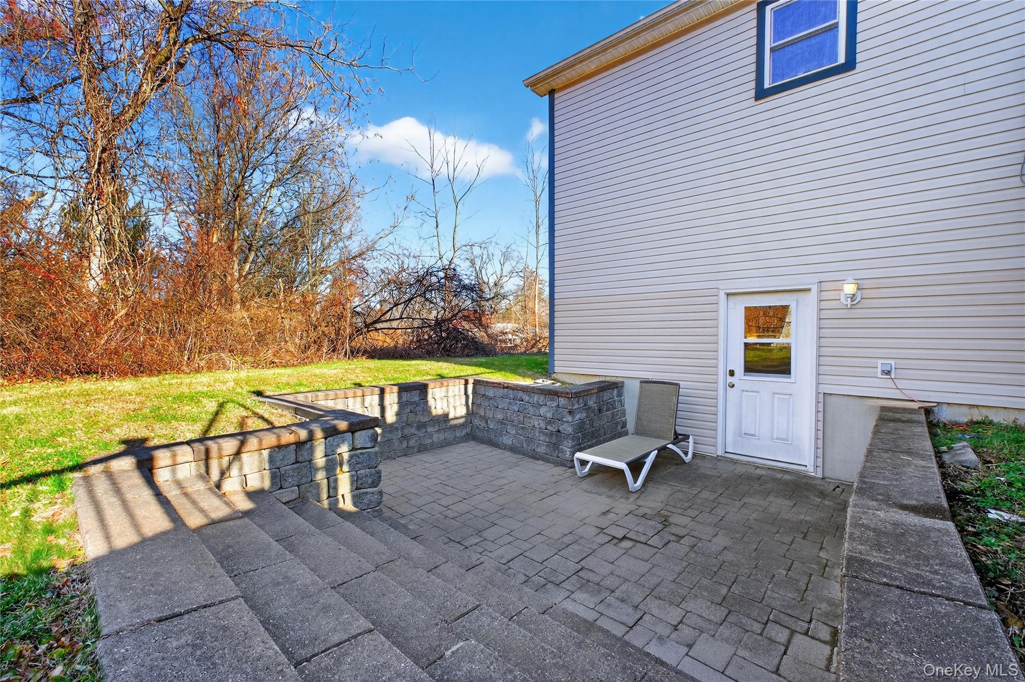 387 Cornwall Hill Road Patterson, NY 12563 - Photo 33 of 50 View of downstairs patio off of Bar area Entertainers Delight!