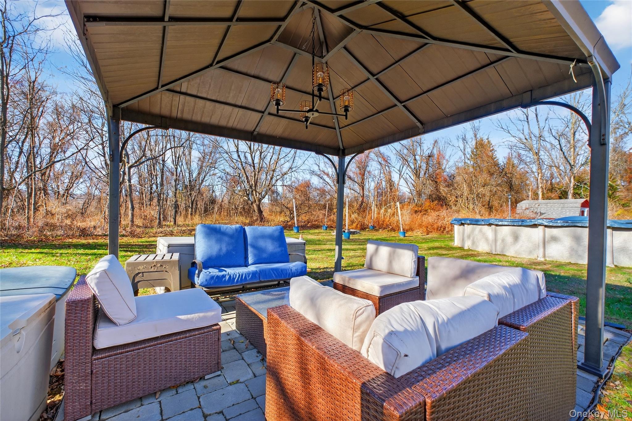 387 Cornwall Hill Road Patterson, NY 12563 - Photo 37 of 47 View of patio / terrace with a gazebo, an outdoor living space, and a covered pool