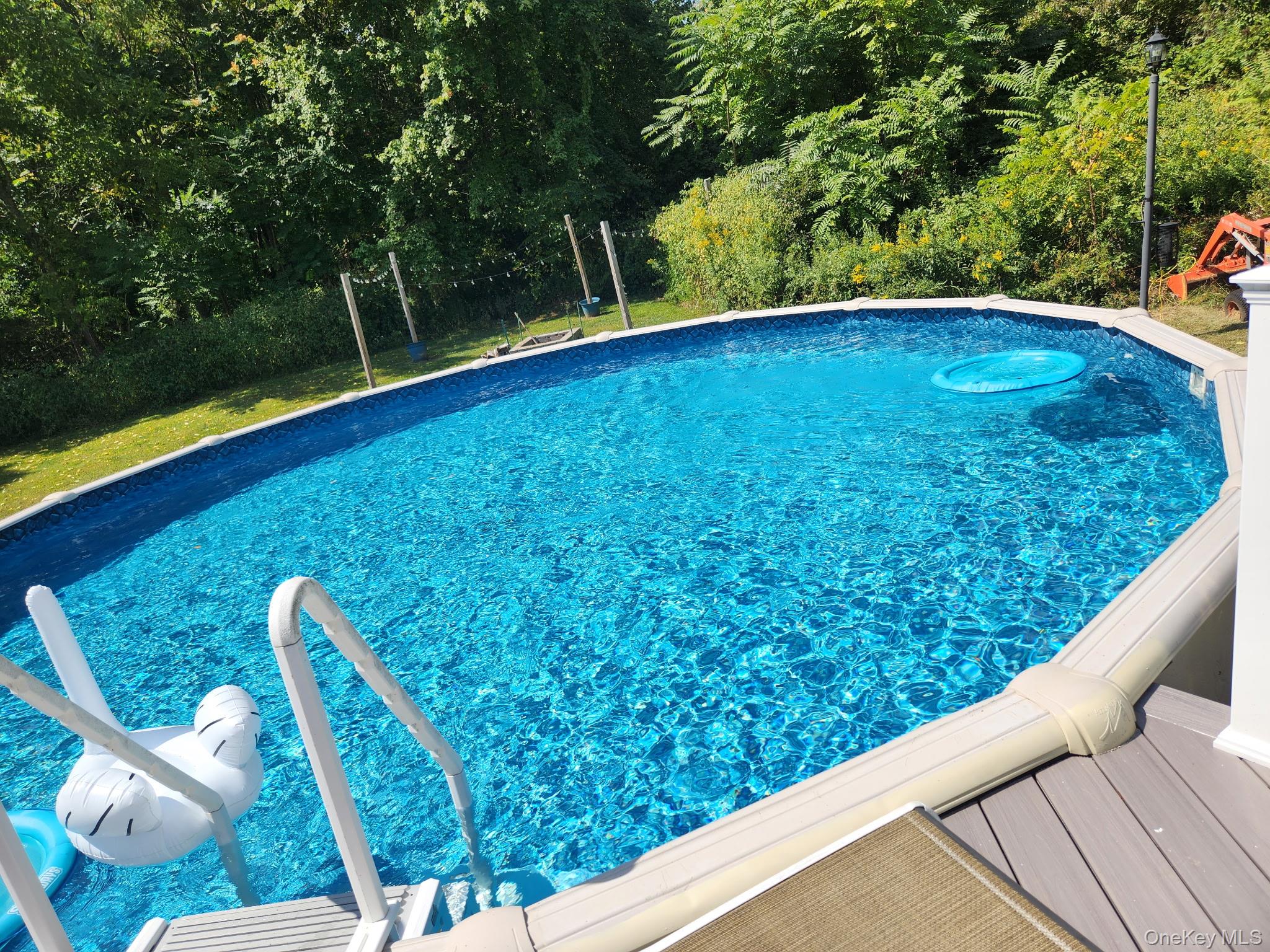 387 Cornwall Hill Road Patterson, NY 12563 - Photo 38 of 50 a view of a swimming pool with a patio
