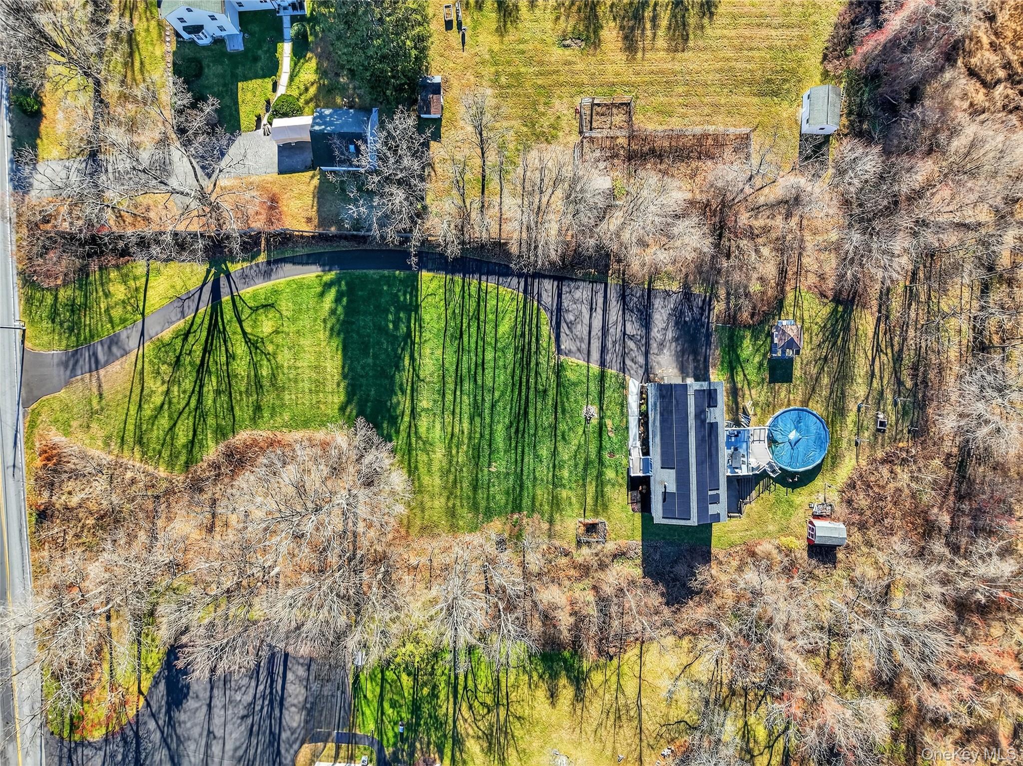 387 Cornwall Hill Road Patterson, NY 12563 - Photo 42 of 47 Aerial view of a pool