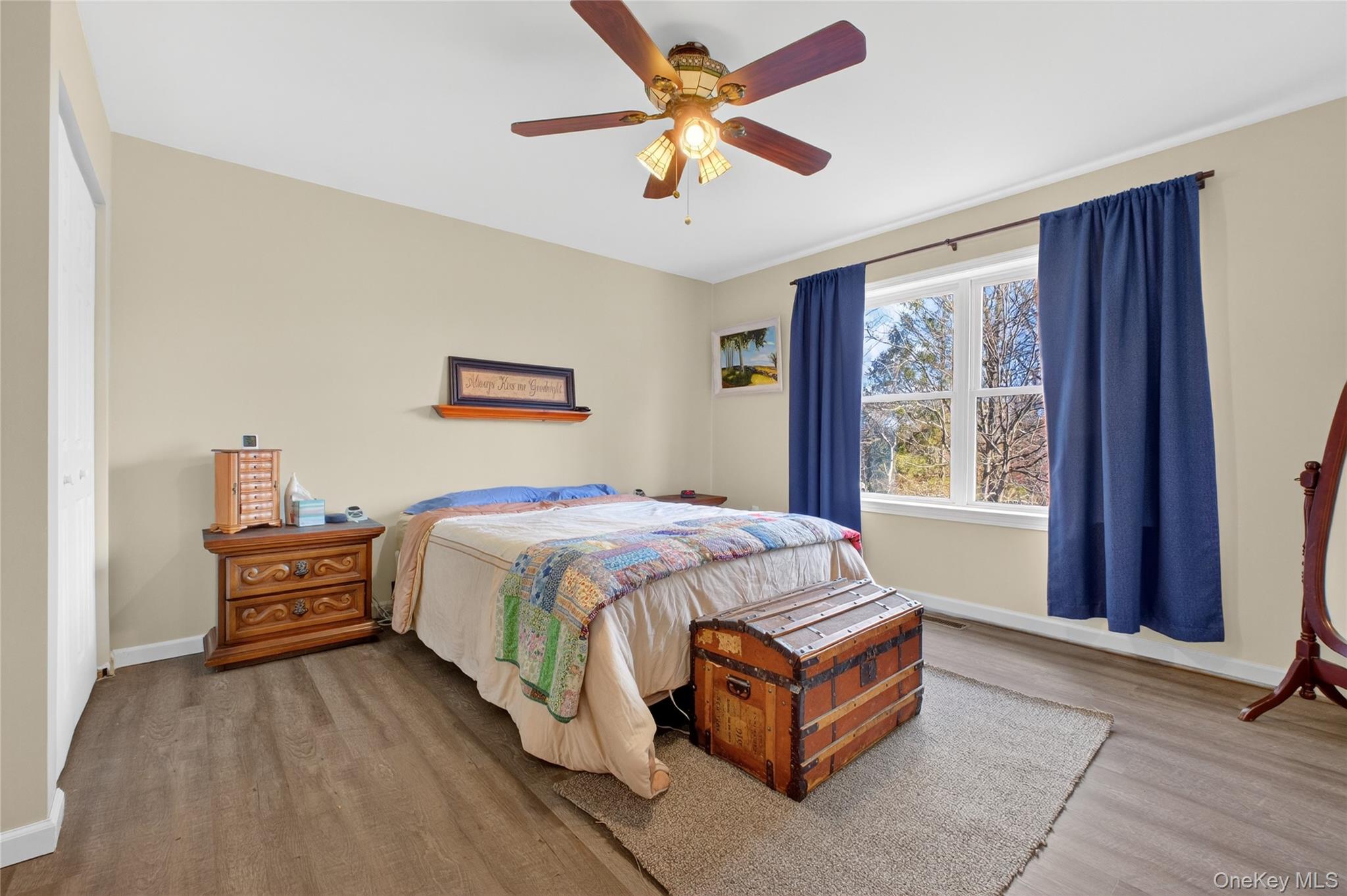 387 Cornwall Hill Road Patterson, NY 12563 - Photo 10 of 43 Upstairs Primary Bedroom with a ceiling fan and wood finished floors