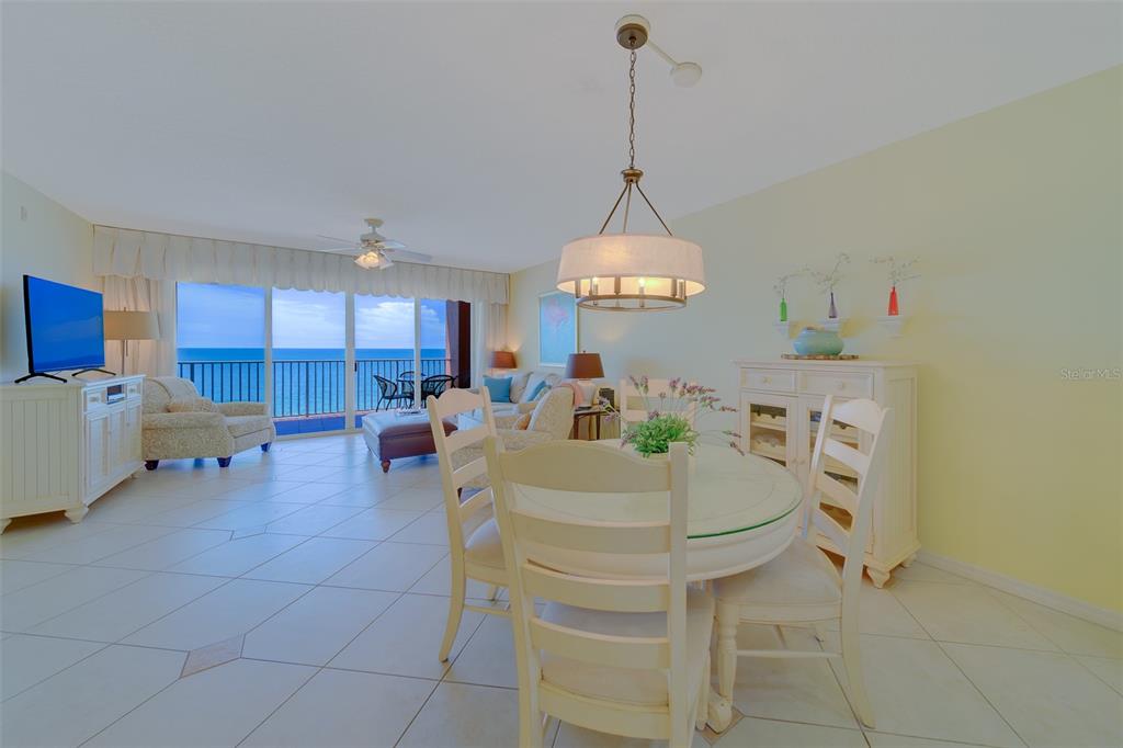 16450 Gulf Boulevard, Unit 564 North Redington Beach, FL 33708 - Photo 7 of 66 a living room with furniture and a table