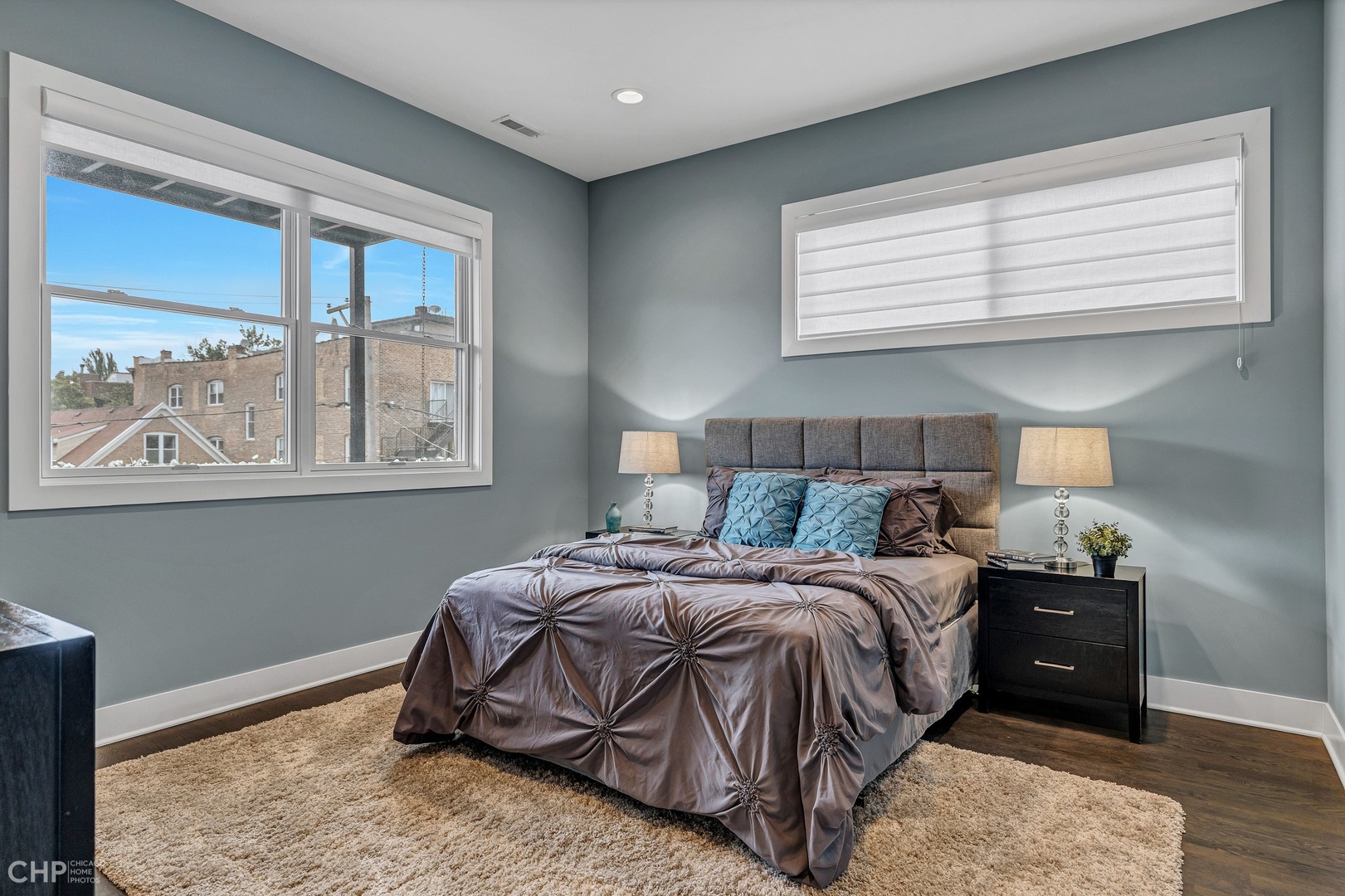 2030 West Rice Street, Unit 2 Chicago, IL 60622 - Photo 13 of 31 a bedroom with a bed and a window