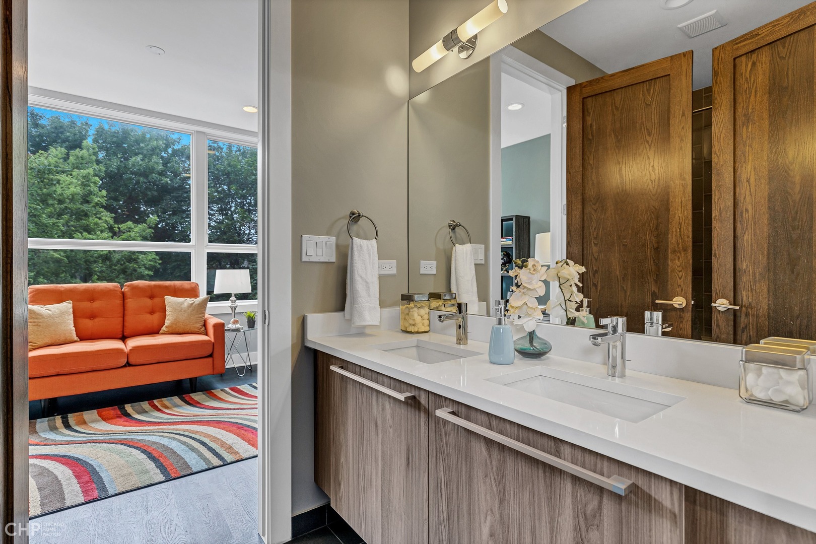 2030 West Rice Street, Unit 2 Chicago, IL 60622 - Photo 23 of 31 a bathroom with a granite countertop sink and a large mirror