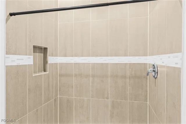 a bathroom with a shower curtain