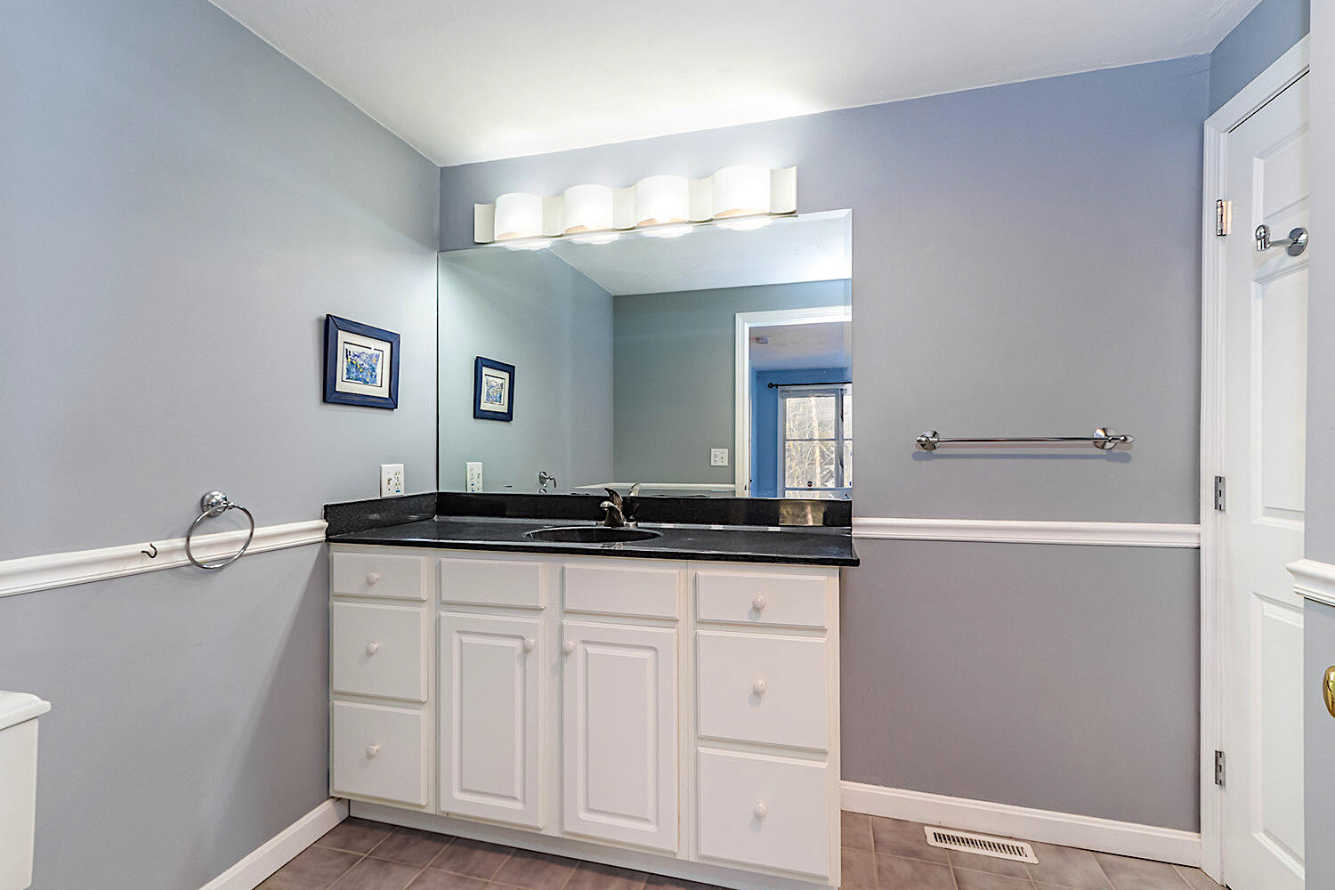 22 Weather Crescent Circle Mashpee, MA 02649 - Photo 15 of 29 a bathroom with a sink and a mirror