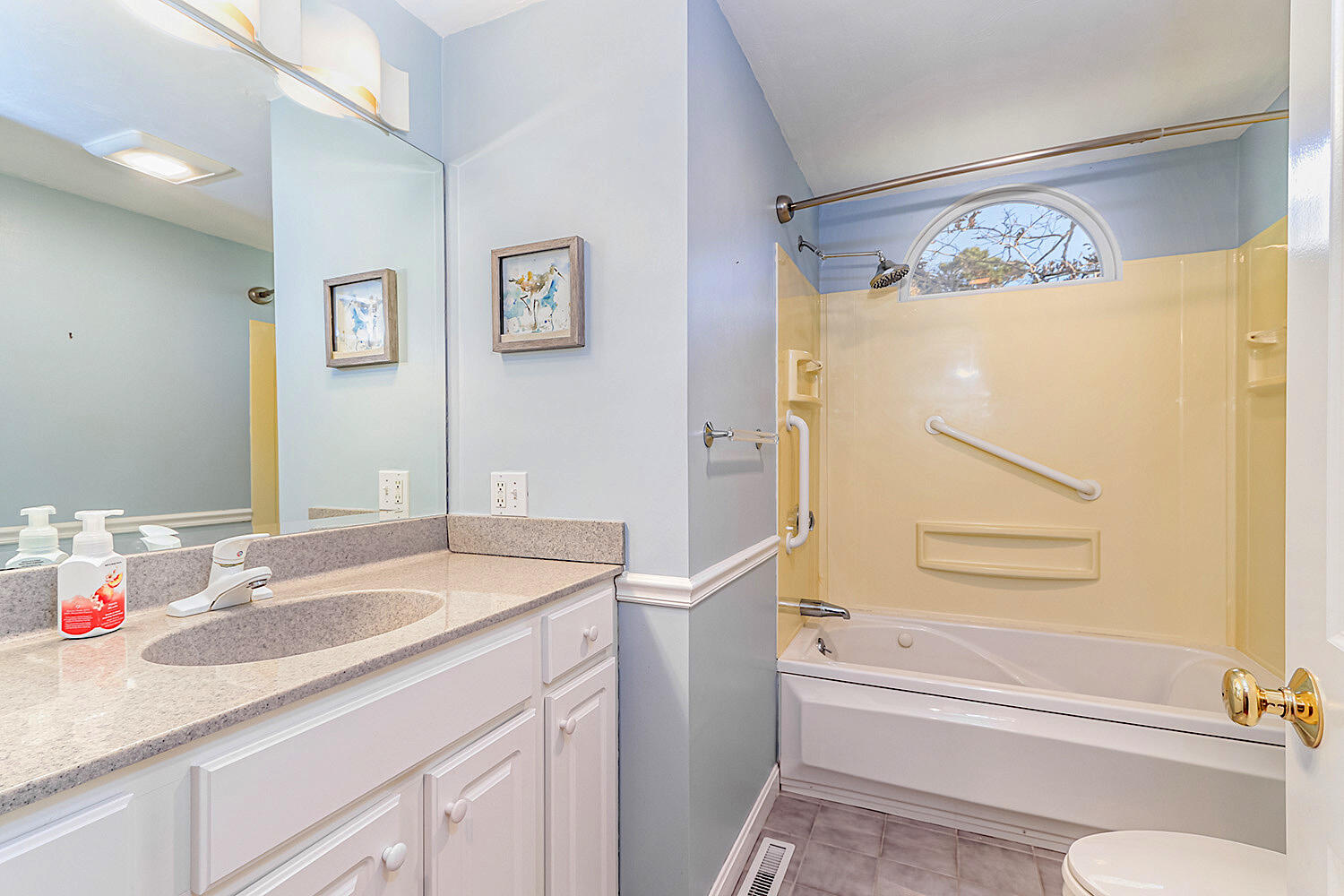 22 Weather Crescent Circle Mashpee, MA 02649 - Photo 20 of 29 a bathroom with a granite countertop sink and a mirror