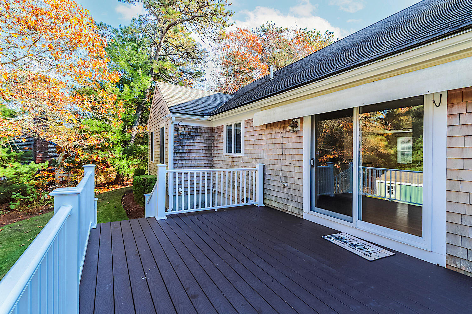 22 Weather Crescent Circle Mashpee, MA 02649 - Photo 24 of 29 a view of a house with a deck