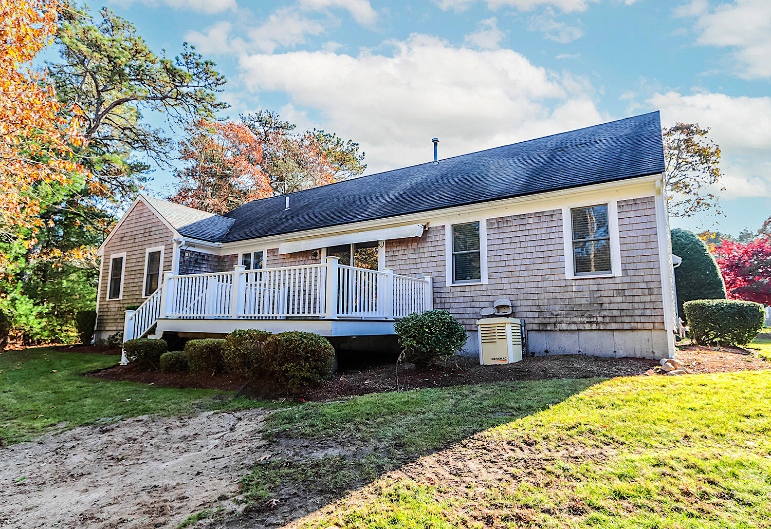 22 Weather Crescent Circle Mashpee, MA 02649 - Photo 4 of 29 a front view of a house with garden