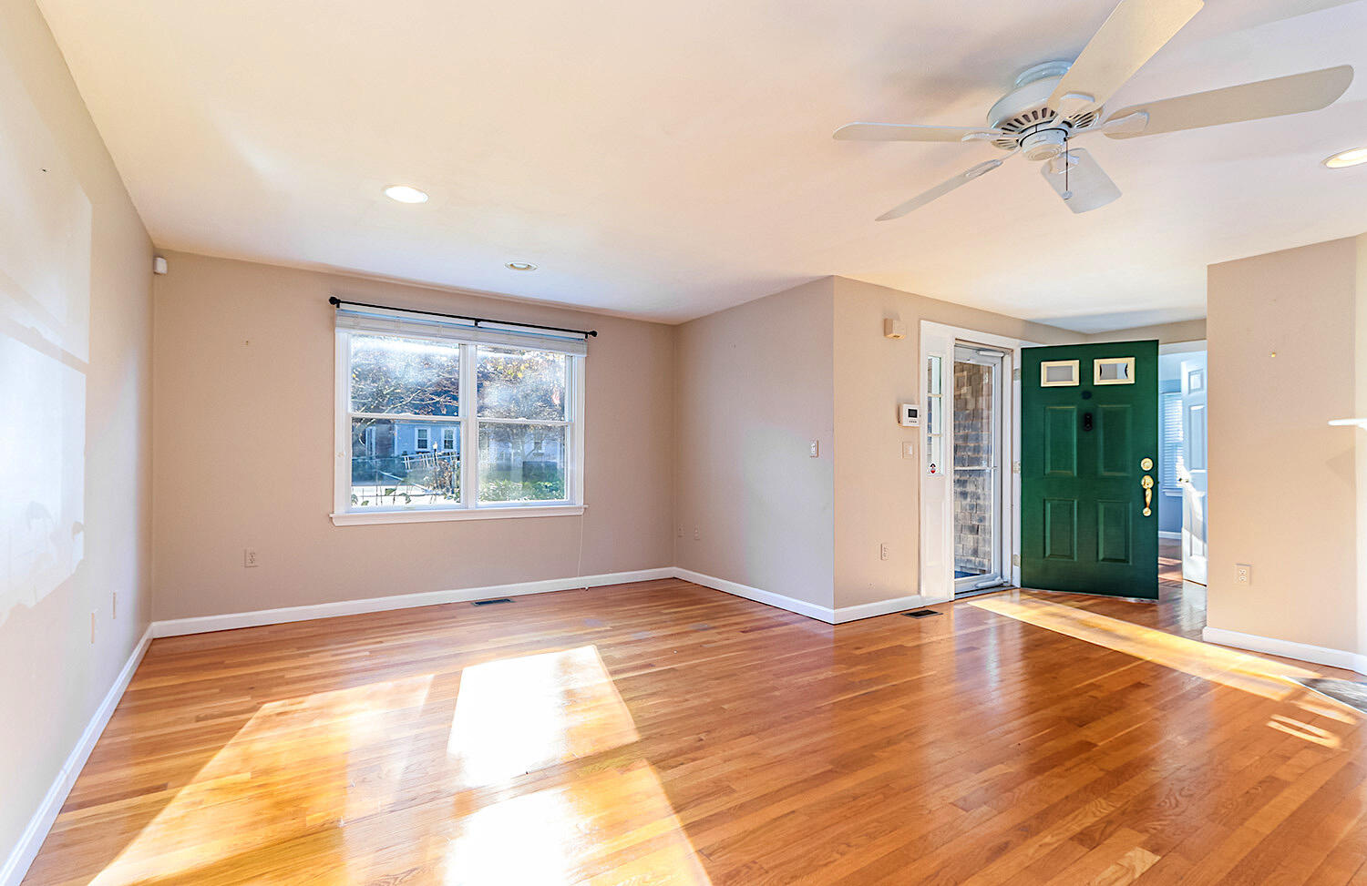 22 Weather Crescent Circle Mashpee, MA 02649 - Photo 6 of 29 a view of an empty room with glass door