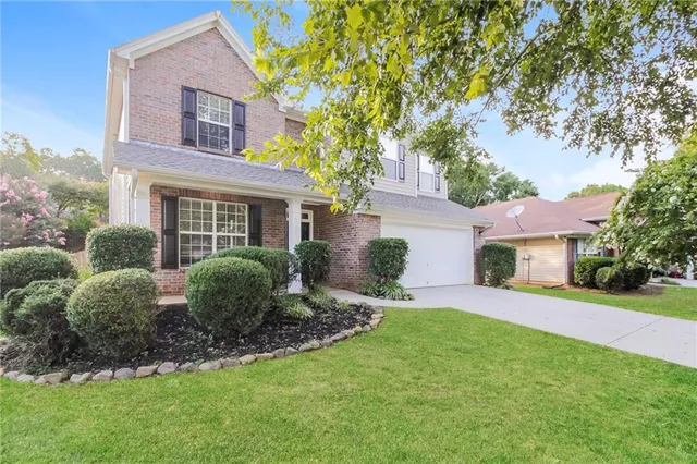 a view of backyard of a house