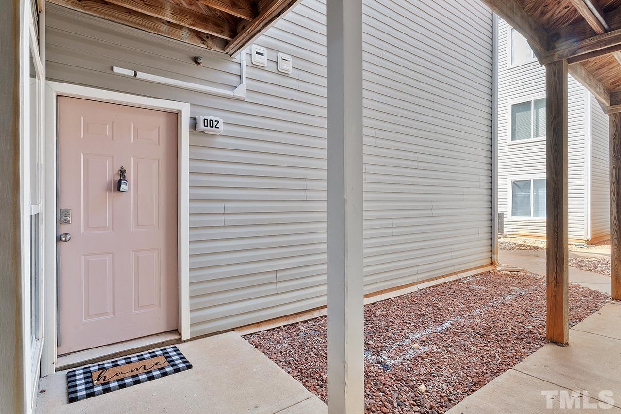 a view of a door and a window