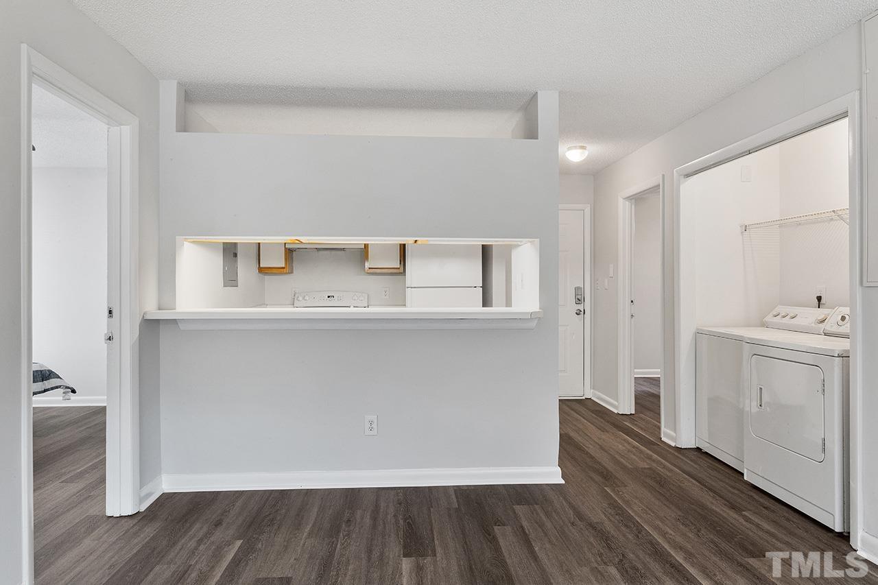 1241 University Court, Unit 2 Raleigh, NC 27606 - Photo 16 of 34 a view of cabinets and wooden floor