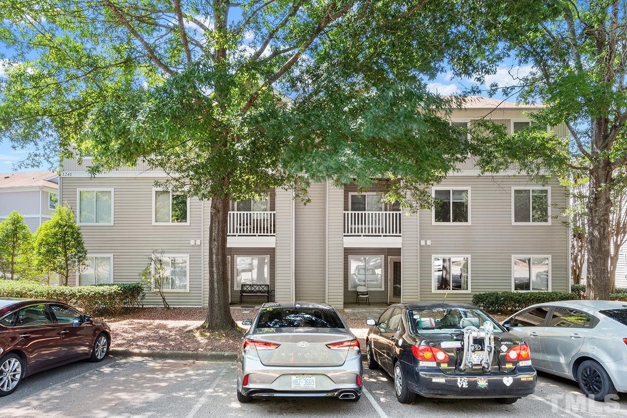 1241 University Court, Unit 2 Raleigh, NC 27606 - Photo 32 of 34 a car parked in front of a house