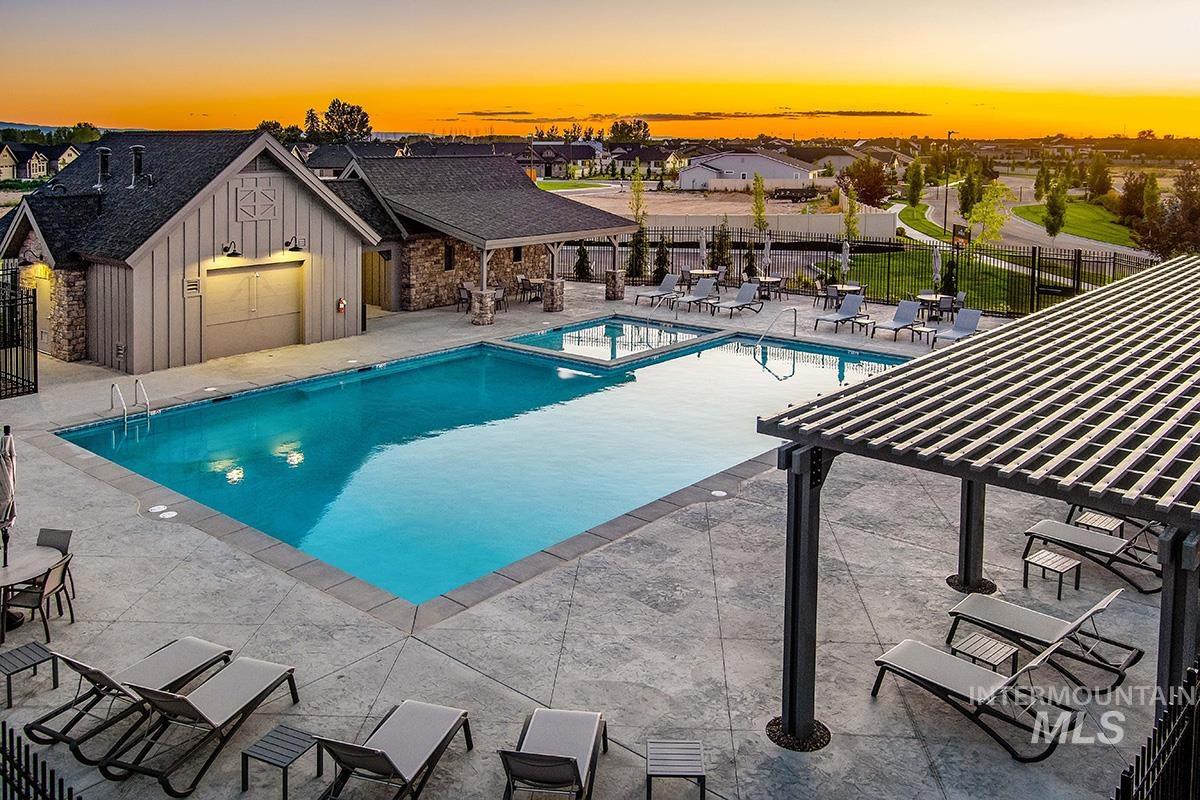 6975 South Skybreak Lane Meridian, ID 83642 - Photo 25 of 29 View of pool with a patio, a pergola, and a pool with connected hot tub